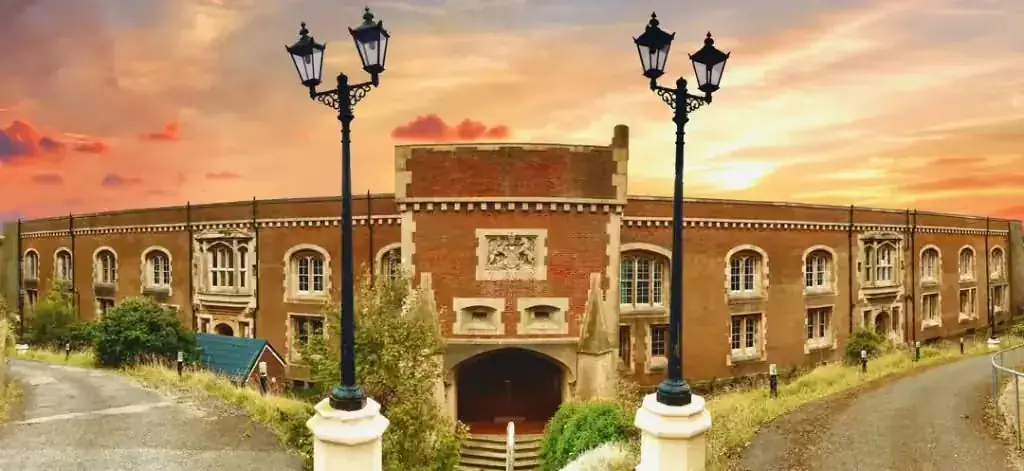 Officers' mess — red-brick Victorian building with central gatehouse and arched entrance