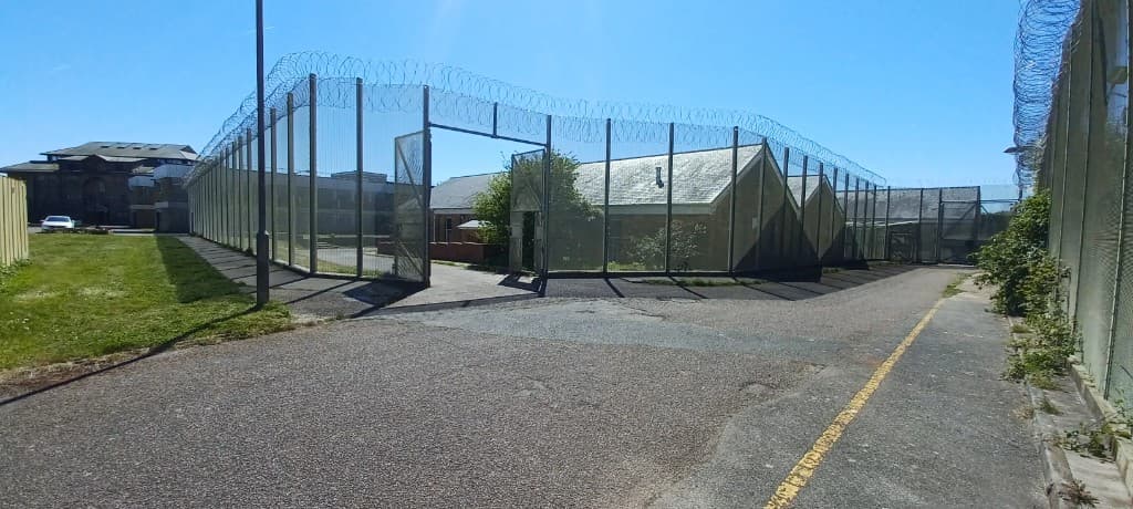 High-security perimeter fencing with razor wire